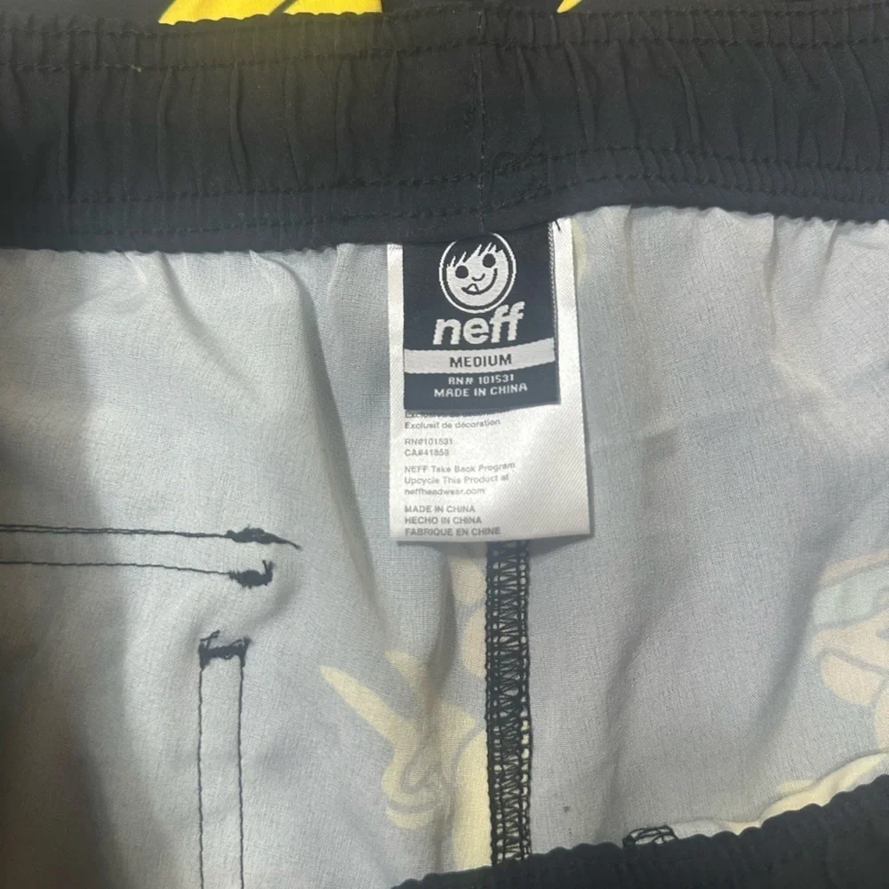 NWOT Neff Black and Yellow Duck Print Swim Trunks